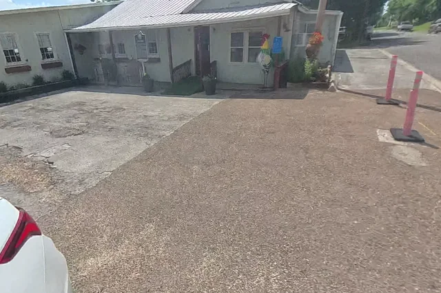 Dewarped 360 audit frame from front approach at 0:08 during the May 25, 2026 Sunken Gardens property walk.