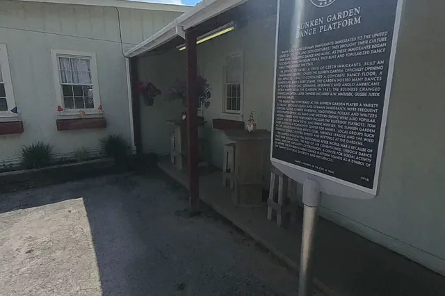 Dewarped 360 audit frame from front approach at 0:38 during the May 25, 2026 Sunken Gardens property walk.