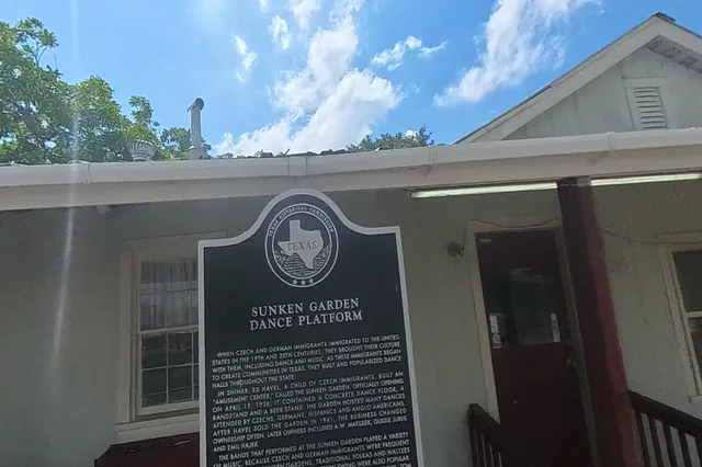 Dewarped 360 audit frame from front approach at 0:48 during the May 25, 2026 Sunken Gardens property walk.
