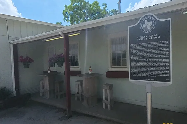 Dewarped 360 audit frame from front approach at 1:18 during the May 25, 2026 Sunken Gardens property walk.
