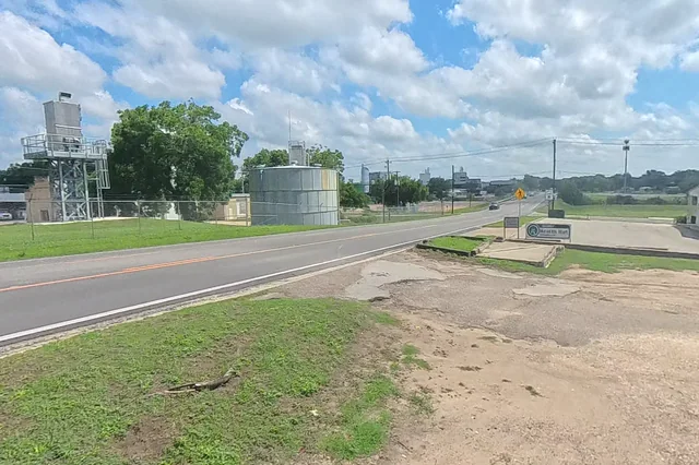 Dewarped 360 audit frame from front approach at 1:48 during the May 25, 2026 Sunken Gardens property walk.