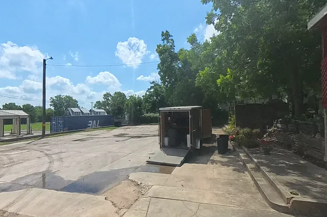 Dewarped 360 audit frame from front approach at 1:58 during the May 25, 2026 Sunken Gardens property walk.