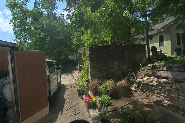 Dewarped 360 audit frame from front approach at 2:08 during the May 25, 2026 Sunken Gardens property walk.