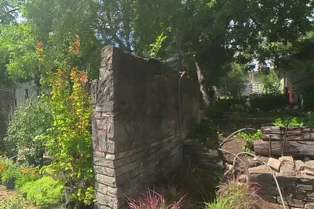 Dewarped 360 audit frame from front approach at 2:18 during the May 25, 2026 Sunken Gardens property walk.