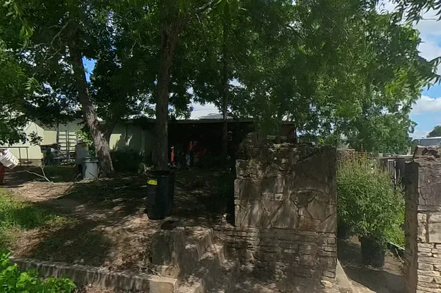Dewarped 360 audit frame from front approach at 2:38 during the May 25, 2026 Sunken Gardens property walk.