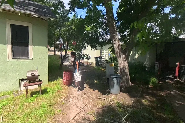 Dewarped 360 audit frame from front approach at 2:48 during the May 25, 2026 Sunken Gardens property walk.