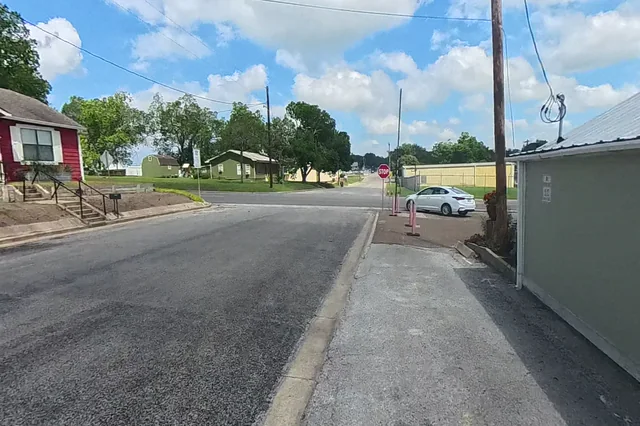 Dewarped 360 audit frame from front approach at 3:18 during the May 25, 2026 Sunken Gardens property walk.