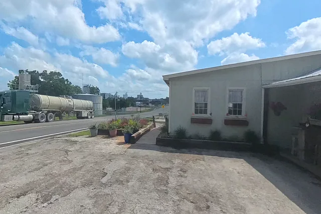 Dewarped 360 audit frame from parking boundary at 3:33 during the May 25, 2026 Sunken Gardens property walk.