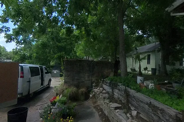 Dewarped 360 audit frame from parking boundary at 4:21 during the May 25, 2026 Sunken Gardens property walk.