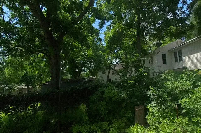 Dewarped 360 audit frame from parking boundary at 5:01 during the May 25, 2026 Sunken Gardens property walk.