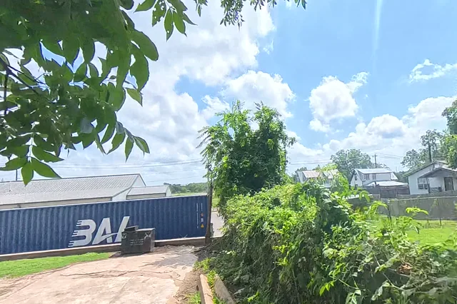 Dewarped 360 audit frame from parking boundary at 5:17 during the May 25, 2026 Sunken Gardens property walk.