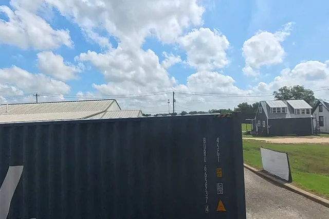 Dewarped 360 audit frame from parking boundary at 5:33 during the May 25, 2026 Sunken Gardens property walk.