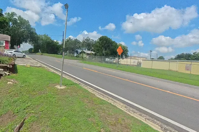 Dewarped 360 audit frame from parking boundary at 6:45 during the May 25, 2026 Sunken Gardens property walk.