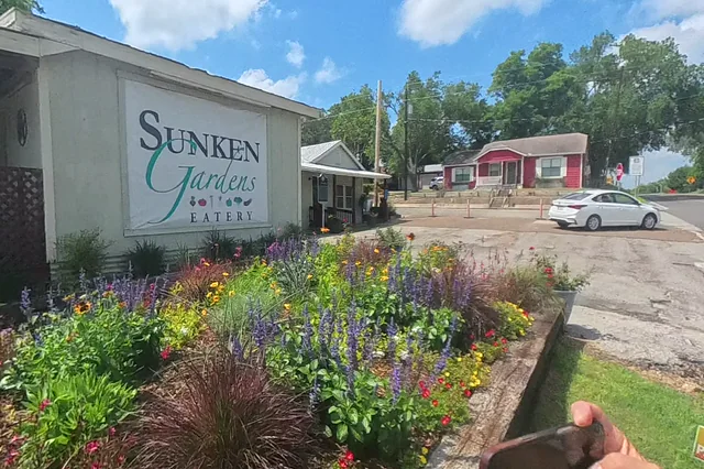 Dewarped 360 audit frame from parking boundary at 7:17 during the May 25, 2026 Sunken Gardens property walk.