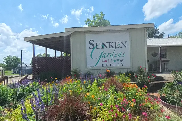 Dewarped 360 audit frame from frontage horseshoe at 7:35 during the May 25, 2026 Sunken Gardens property walk.