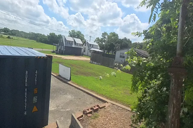 Dewarped 360 audit frame from frontage horseshoe at 11:25 during the May 25, 2026 Sunken Gardens property walk.