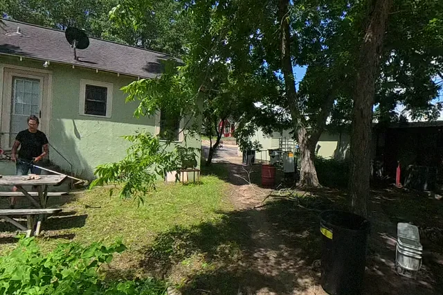 Dewarped 360 audit frame from frontage horseshoe at 11:55 during the May 25, 2026 Sunken Gardens property walk.