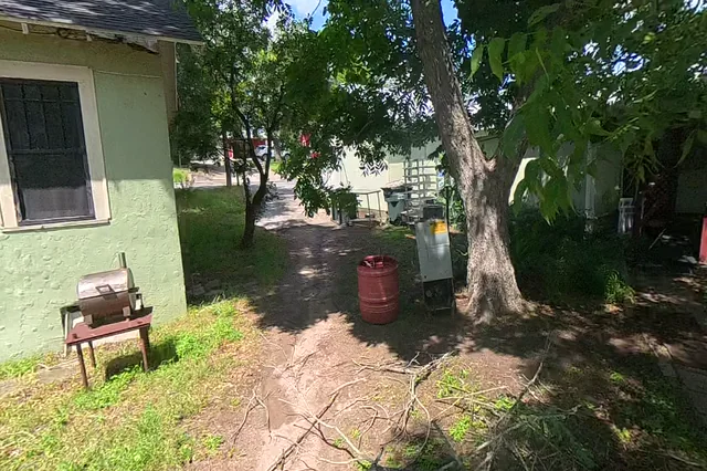 Dewarped 360 audit frame from back garden at 12:20 during the May 25, 2026 Sunken Gardens property walk.