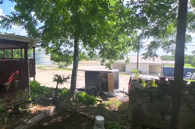 Dewarped 360 audit frame from back garden at 12:34 during the May 25, 2026 Sunken Gardens property walk.