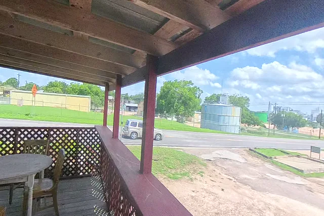 Dewarped 360 audit frame from back garden at 12:55 during the May 25, 2026 Sunken Gardens property walk.