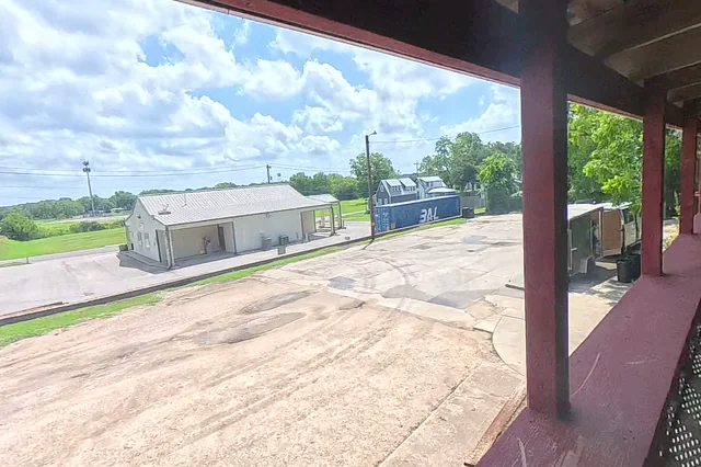 Dewarped 360 audit frame from back garden at 13:09 during the May 25, 2026 Sunken Gardens property walk.