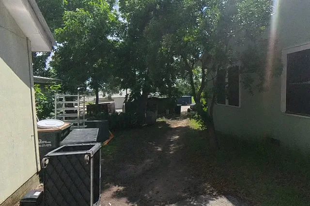 Dewarped 360 audit frame from back garden at 14:05 during the May 25, 2026 Sunken Gardens property walk.