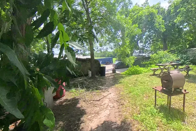 Dewarped 360 audit frame from back garden at 14:12 during the May 25, 2026 Sunken Gardens property walk.