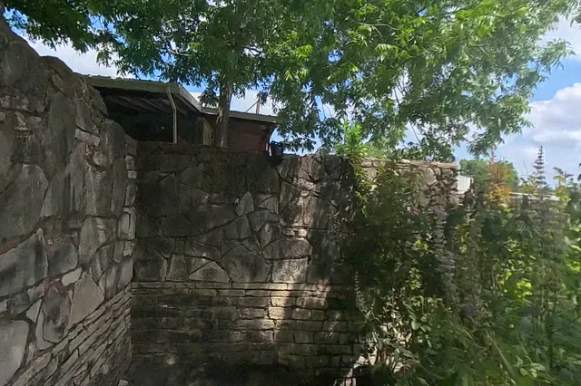 Dewarped 360 audit frame from back garden at 14:47 during the May 25, 2026 Sunken Gardens property walk.