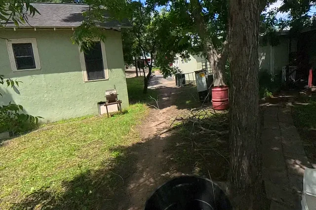 Dewarped 360 audit frame from stone patio and courtyard at 15:01 during the May 25, 2026 Sunken Gardens property walk.