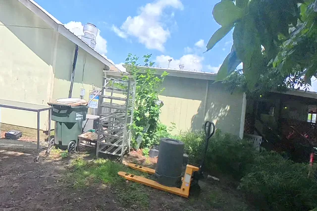 Dewarped 360 audit frame from stone patio and courtyard at 15:22 during the May 25, 2026 Sunken Gardens property walk.