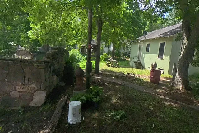 Dewarped 360 audit frame from stone patio and courtyard at 15:57 during the May 25, 2026 Sunken Gardens property walk.