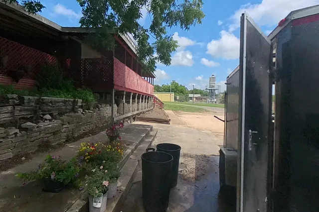 Dewarped 360 audit frame from stone patio and courtyard at 16:39 during the May 25, 2026 Sunken Gardens property walk.
