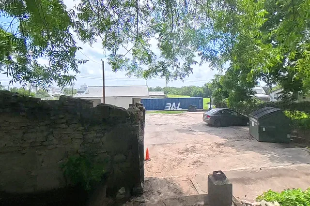 Dewarped 360 audit frame from return and shared-wall branch at 18:04 during the May 25, 2026 Sunken Gardens property walk.